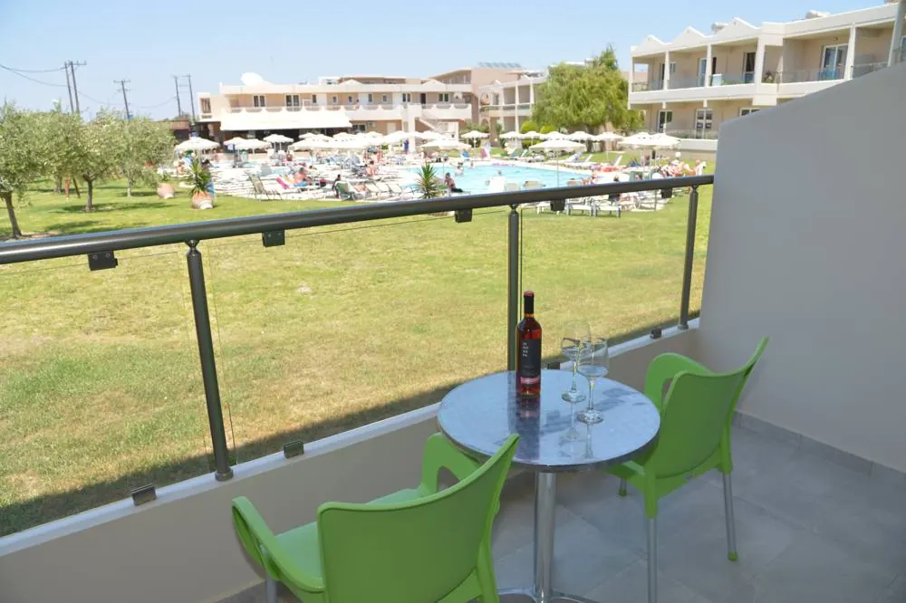 Balcony with garden and pool view